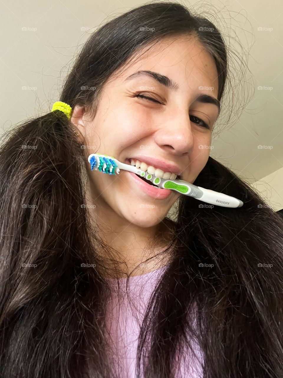 Energetic, Vibrant Portrait of girl with Toothbrush