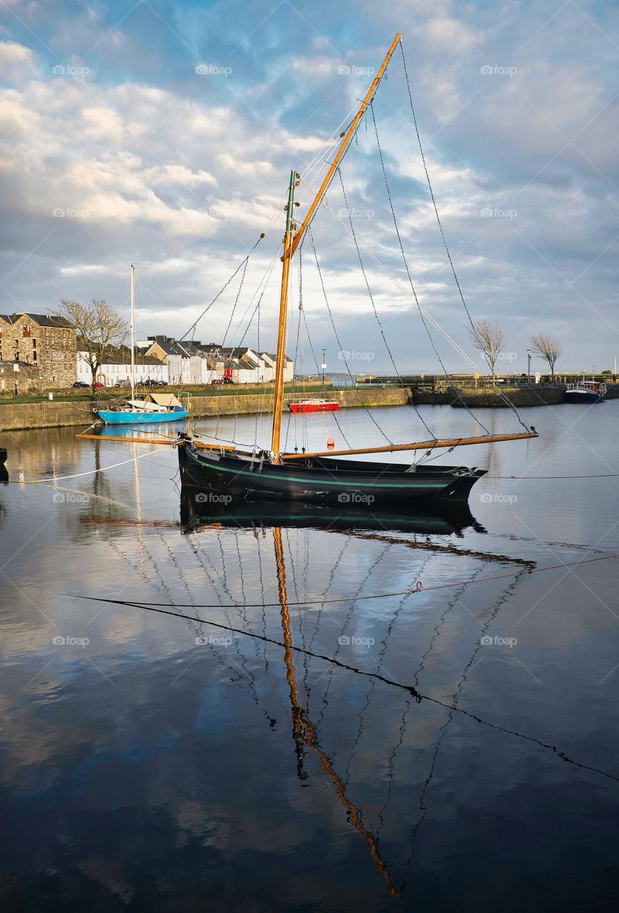 Old wooden fishing boat Galway hooker at Claddagh, Galway City, Ireland
