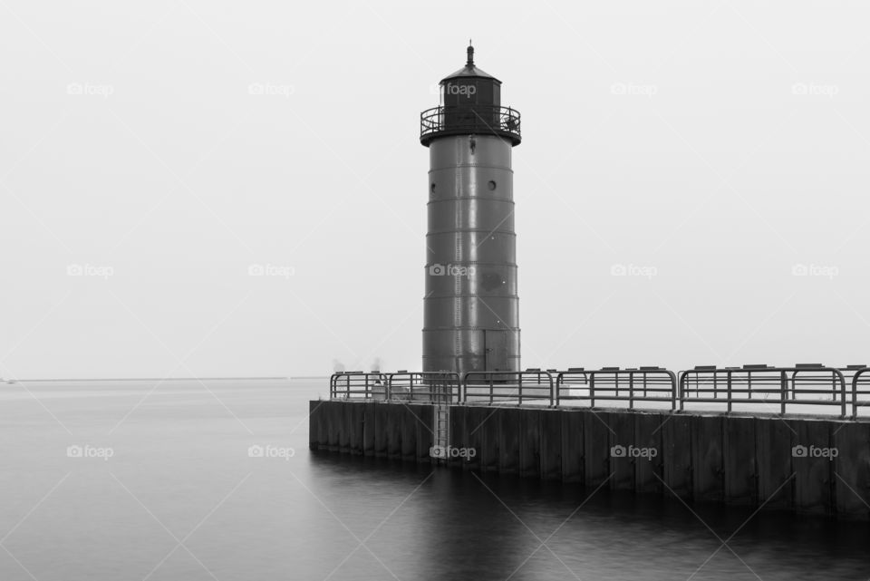 Lighthouse in Black and White. Black and white lighthouse on Lake Michigan in Milwaukee, WI