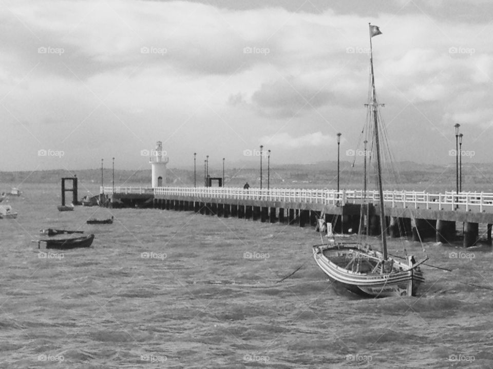 Fishboat and lighthouse