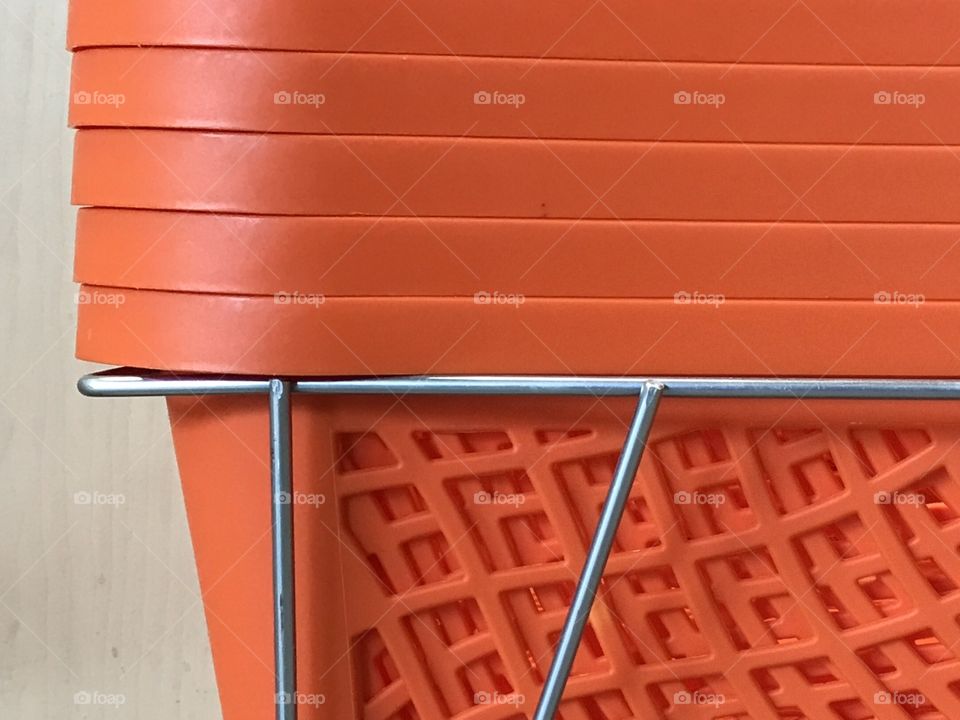 Stacked of orange baskets