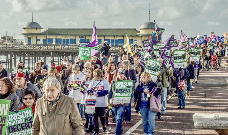 A crowd of protesters on a demonstration in the seaside town of Hastings, UK