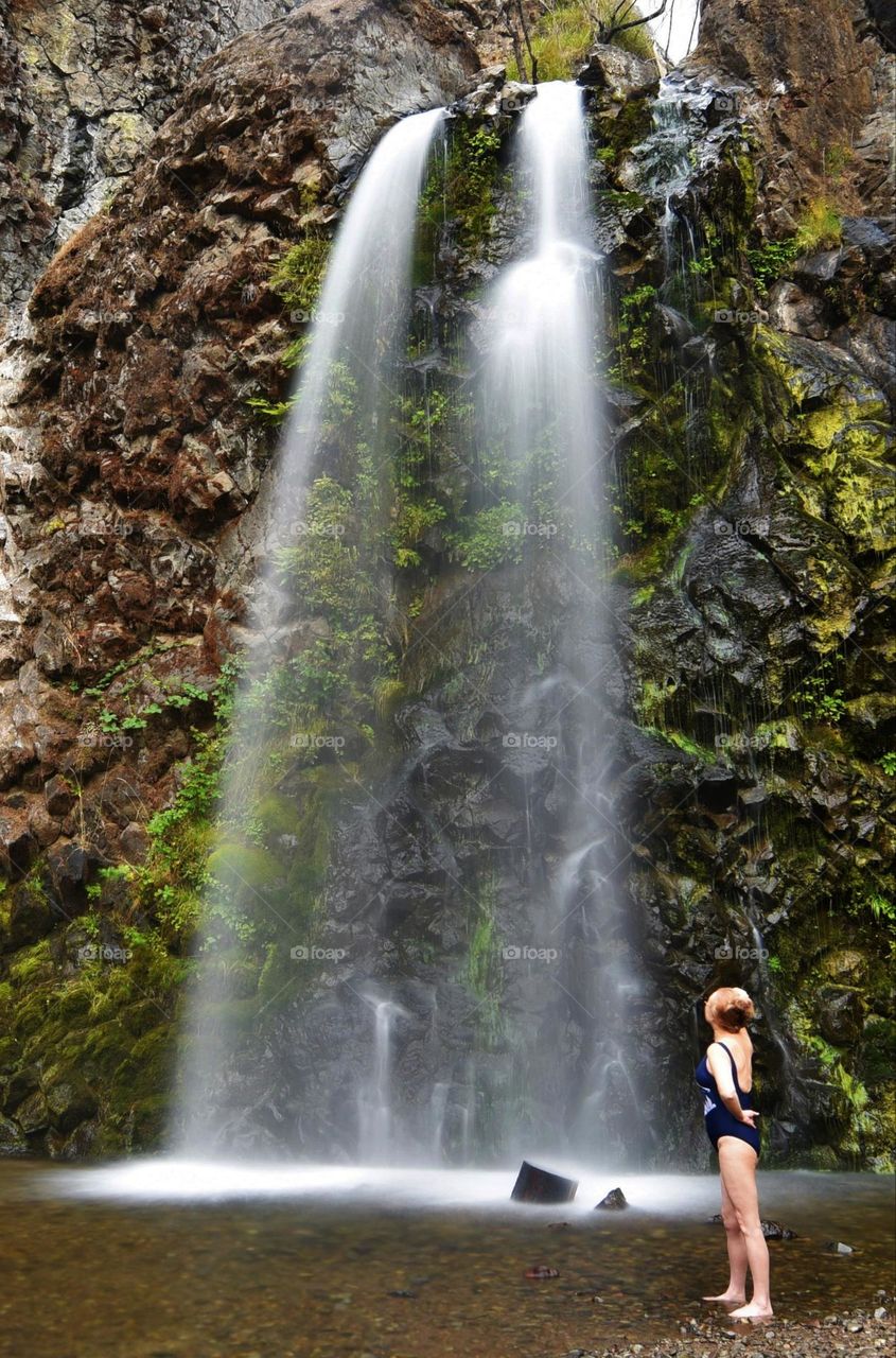 A curtain of water falls from the sky