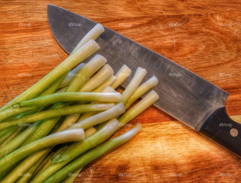 Chopped Green Onions. Onions On A Cutting Board
