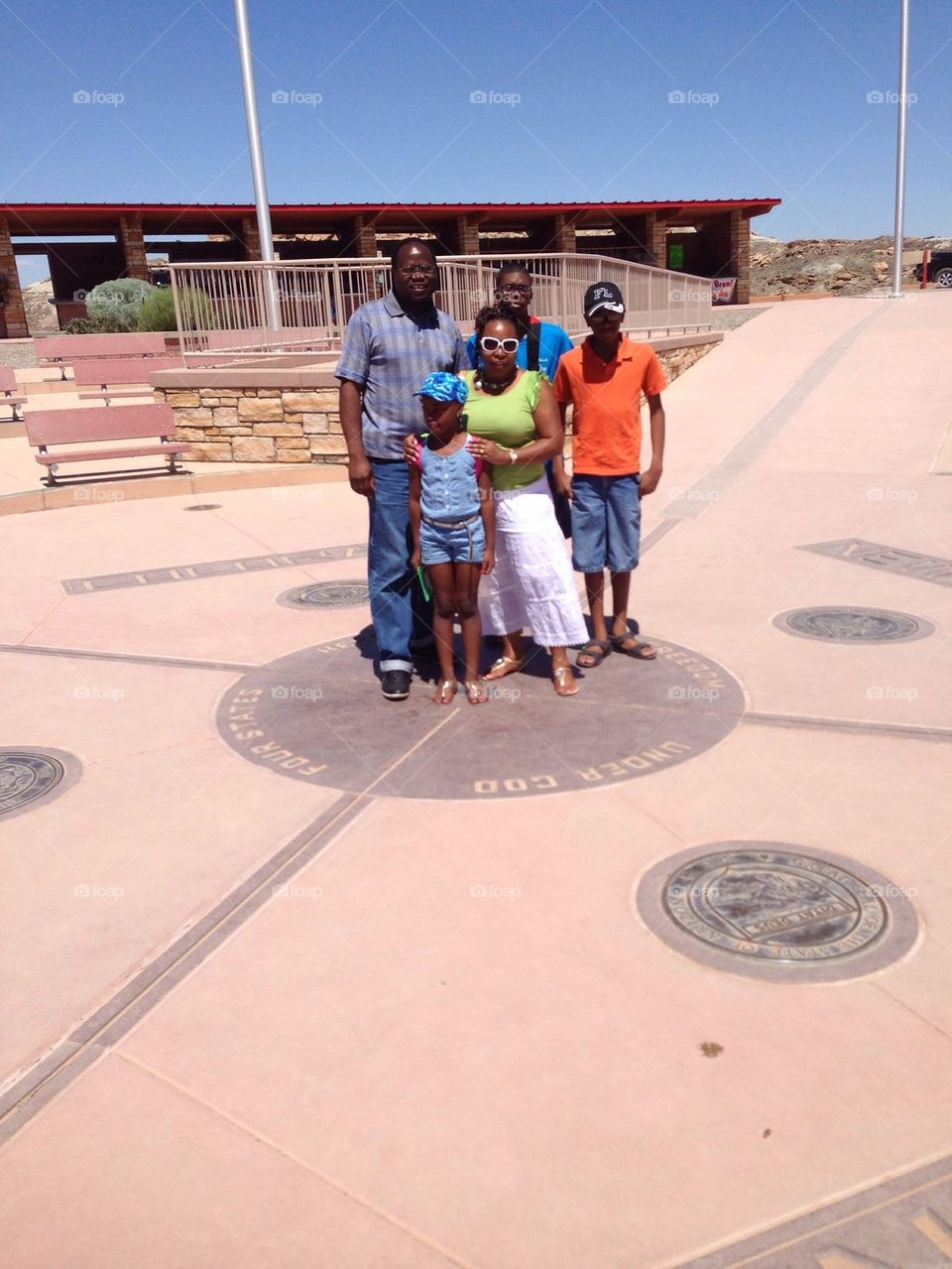 Standing at Four Corners Monument