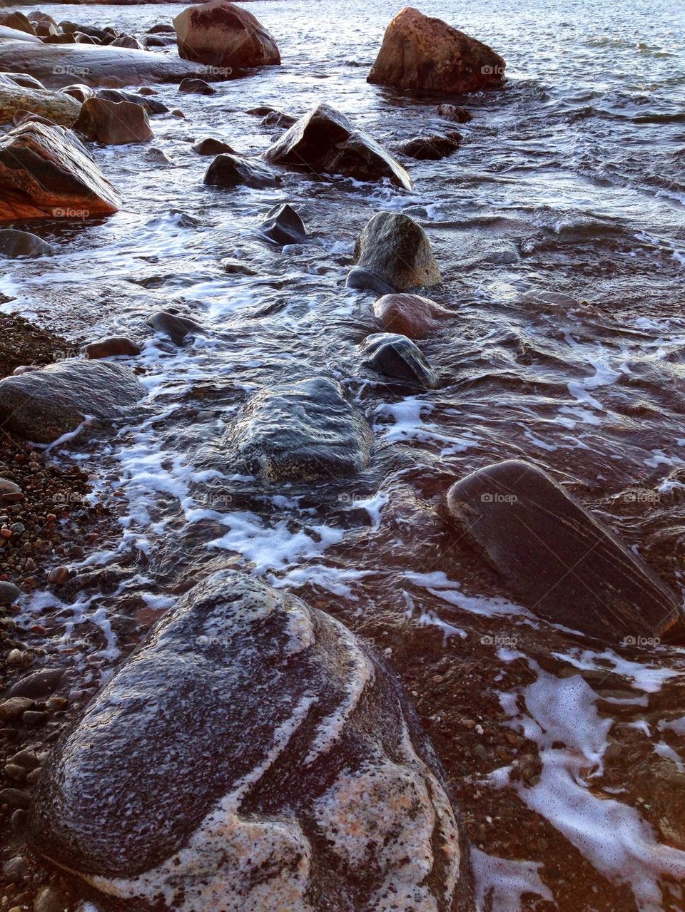 Close-up view of rocks and sea