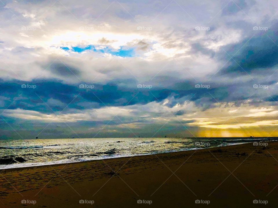 Sunset with reflections and clouds and sky