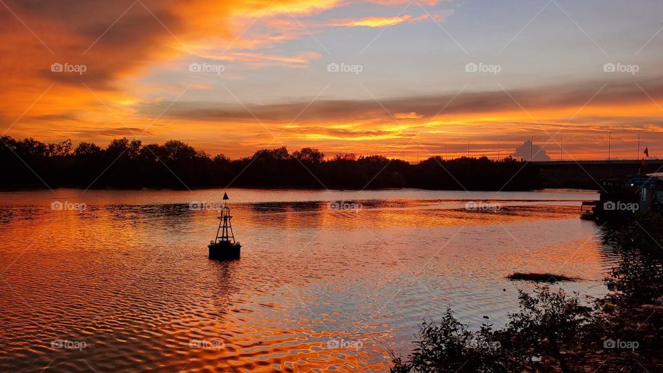 Orange sunset on the river - sunset in Ho Chi Minh city , Vietnam 🇻🇳