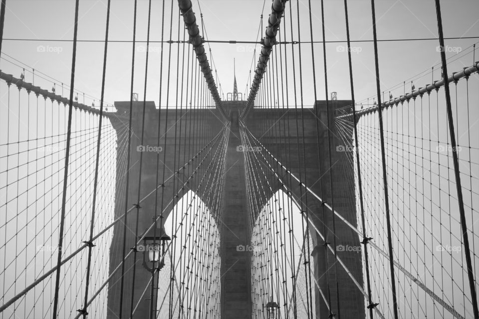 Brooklyn Bridge shot in the morning, clear sky in the background