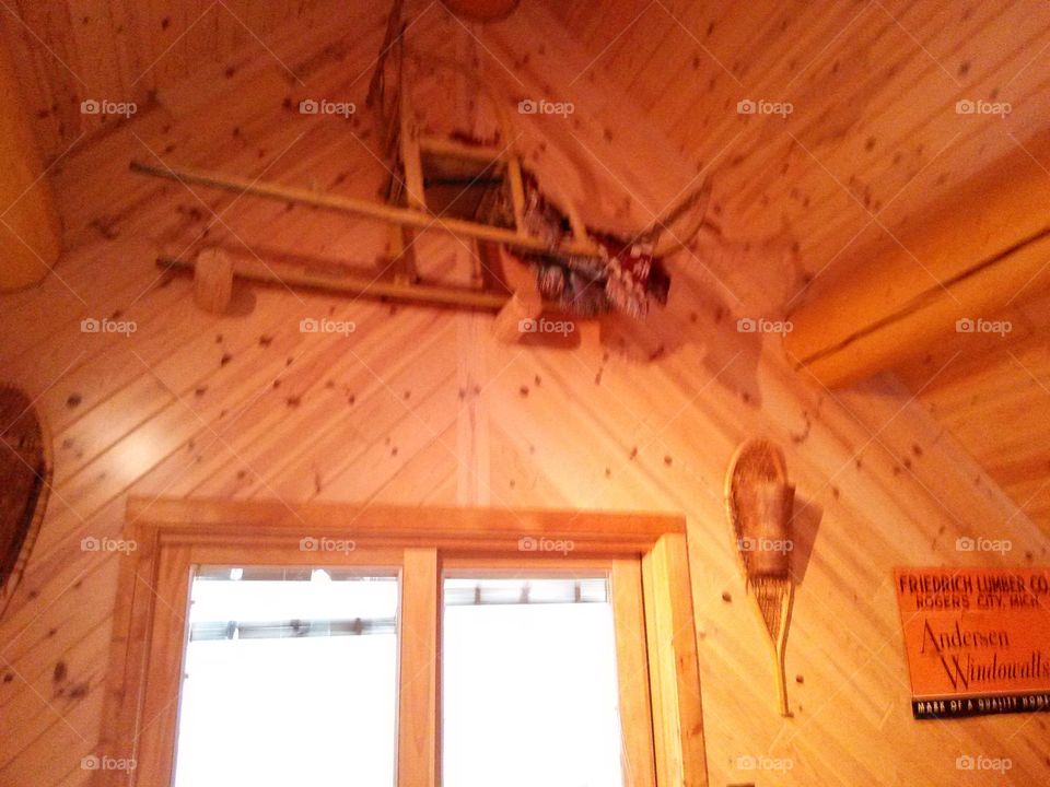 Log home interior design. Decorations inside a large log home