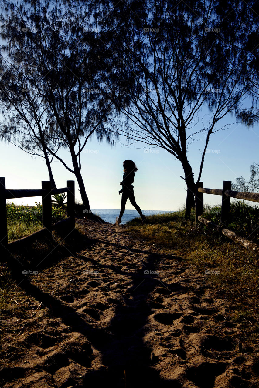 Girl silhouette, leap, jump, sand, trees, path, trail