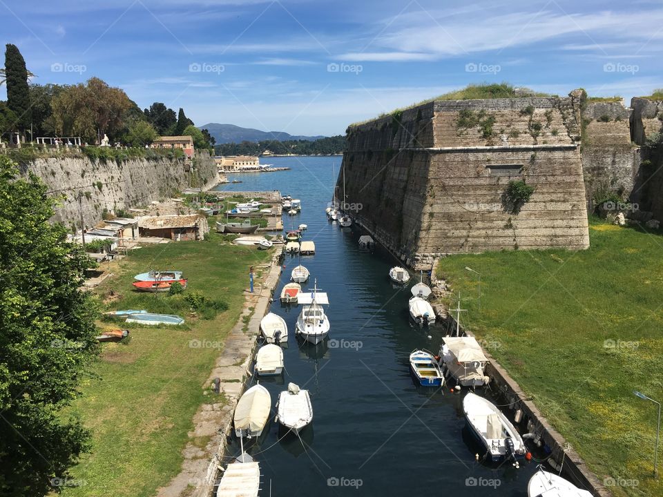 Boats behind Corfu Town Old Fortress, Greece