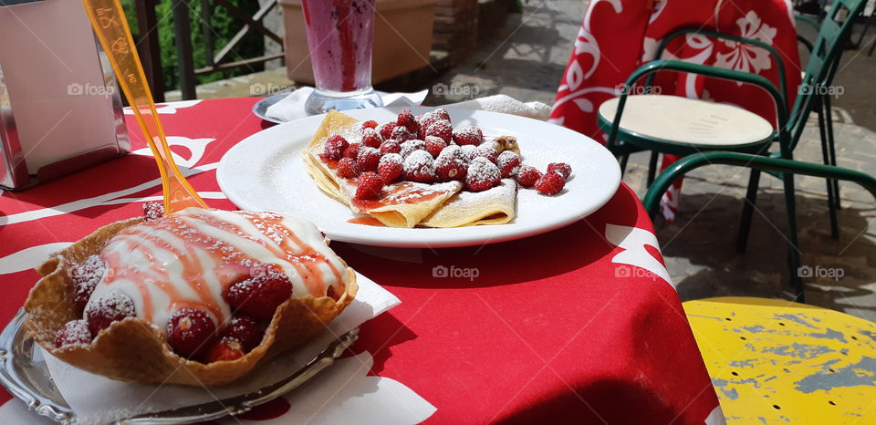 crepes with fresh small strawberry. Tipical dessert in Nemi Rome Italy