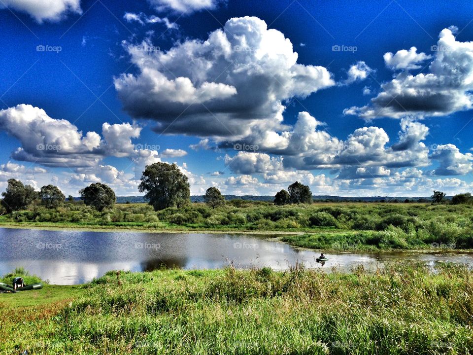 Scenic view of lake against sky