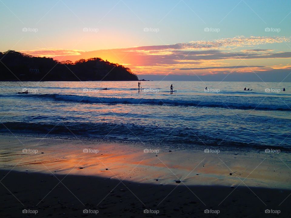 Sunset surfing