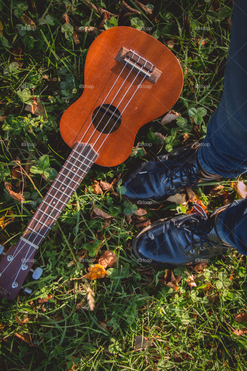 ukulele, boots and leaves