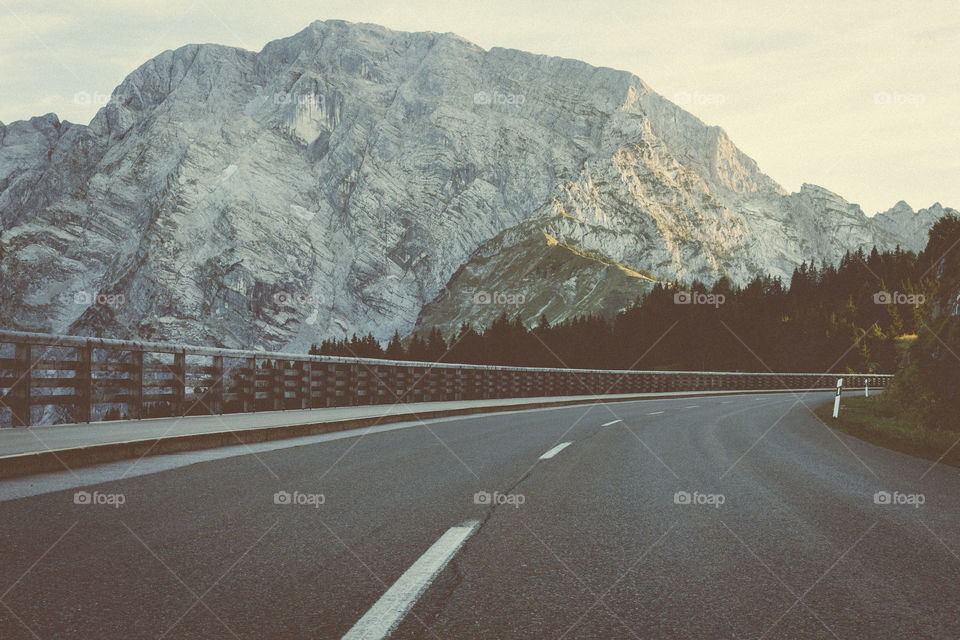 View of dividing line on road and mountain