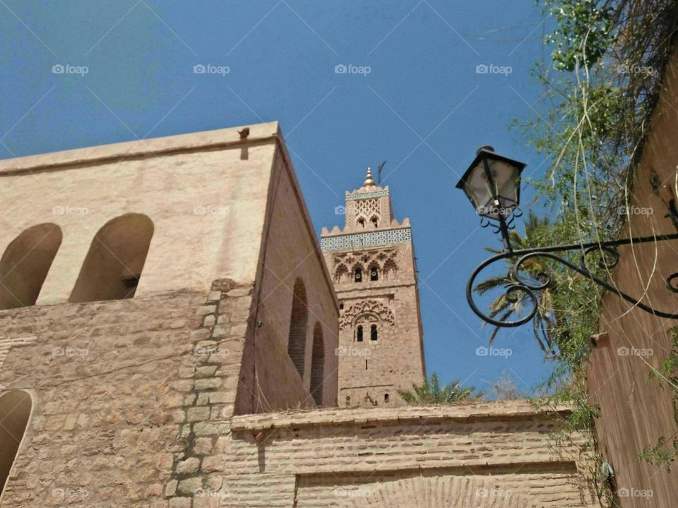 Beautiful and ancient minaret of Kotoubia mosque at marrakech city in Morocco.