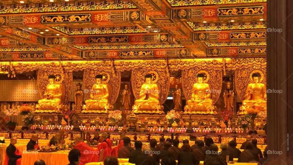 The Monks praying, meditating and chanting in the Room of the 5 Thousand Buddhas. The Po Lin Monastery. Ngong Ping Village, Po Lin Monastery, Lantau Island, Hong Kong.