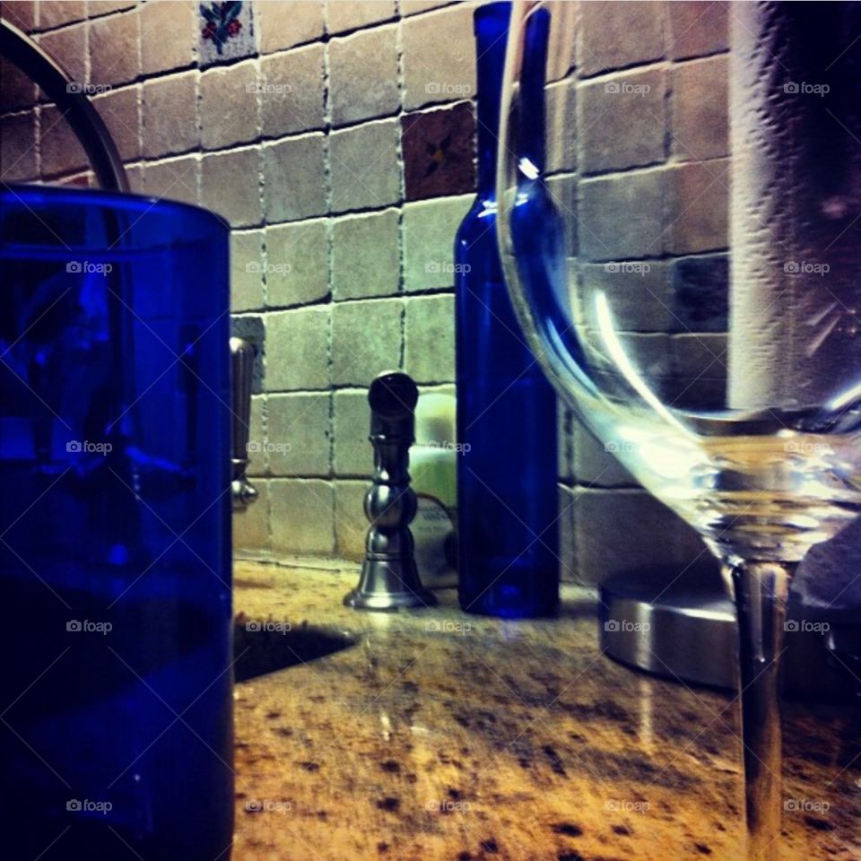 Favorite color blue with a waiting glass of wine. 