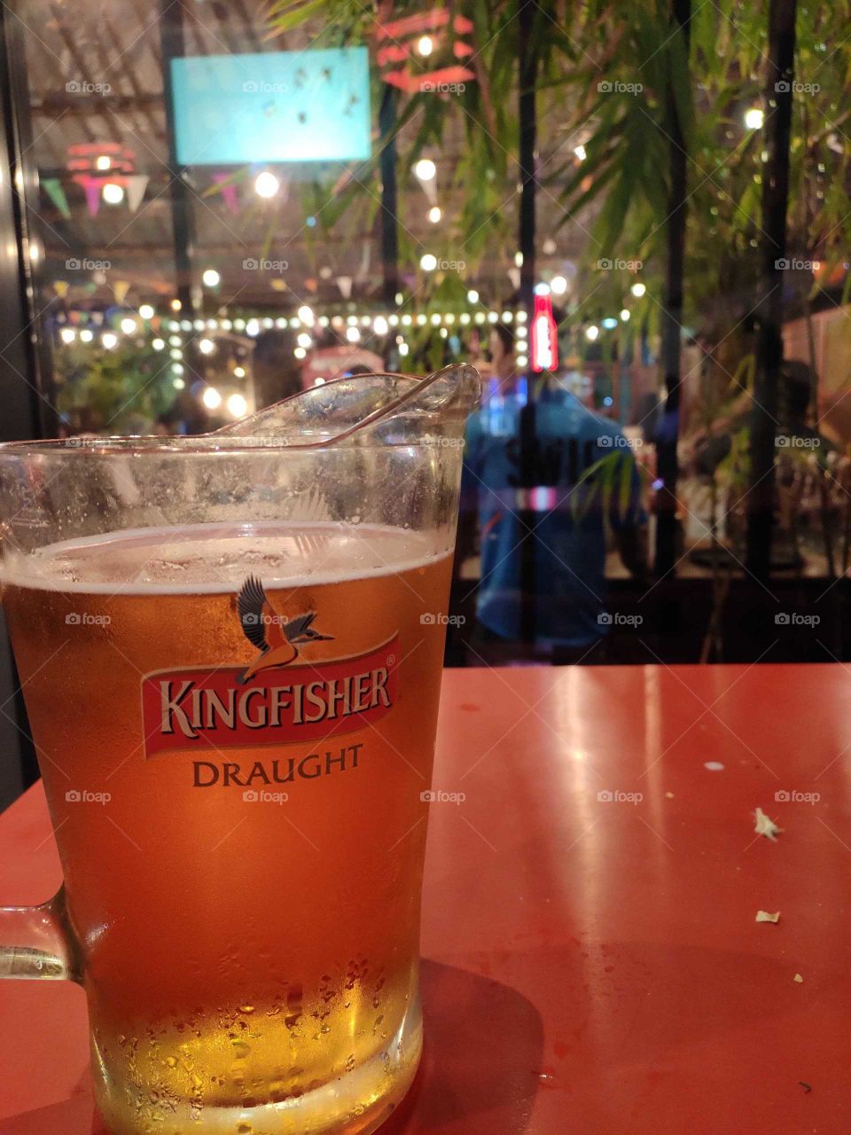 kingfisher draught beer. fresh brewed beer