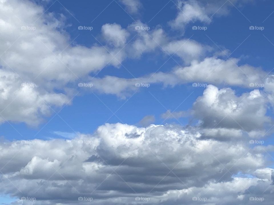White, fluffy clouds in a bright blue sky. Taken in one of my favorite towns, Point Pleasant Beach, NJ. 