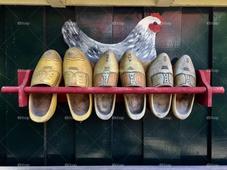 Three pair of wooden shoes