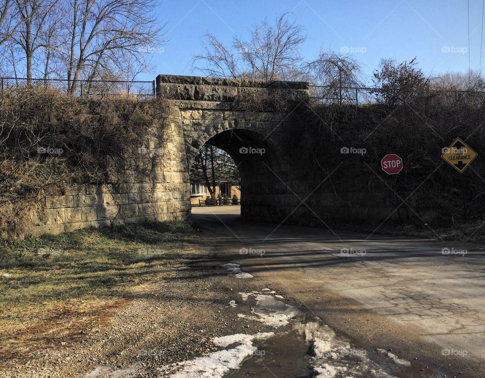 Former railroad overpass over Ely Road in Linn County, Iowa. Now carries pedestrian traffic as a part of the Cedar River Trail. Built 1887. 