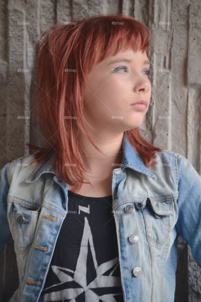 Girl in denimjacket and dreamy face