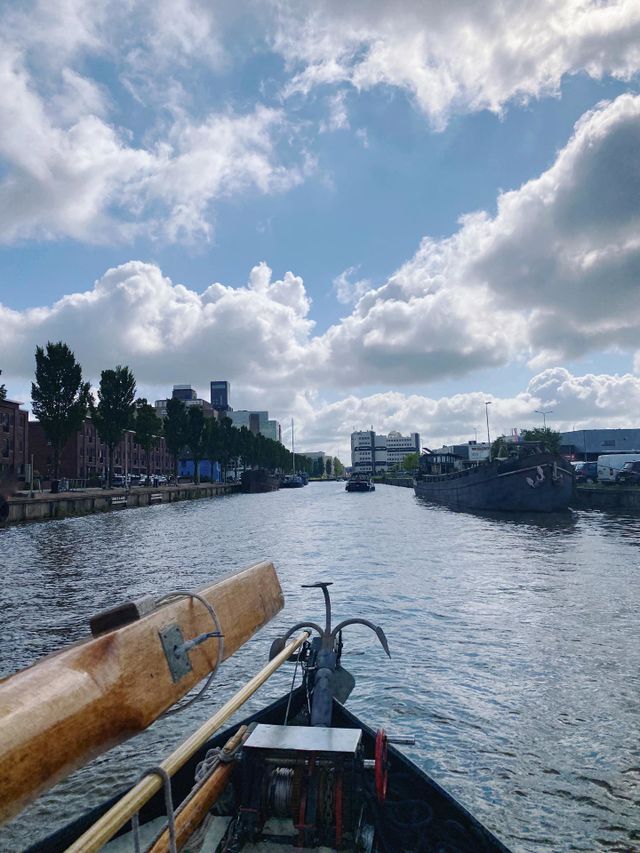 On our boat in the north of Holland! Massive clouds, blue sky. Nature, summer. View from the boat