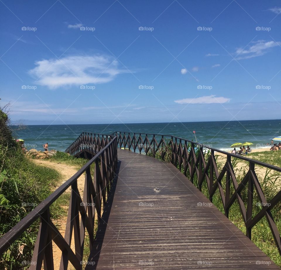 Boardwalk against sea