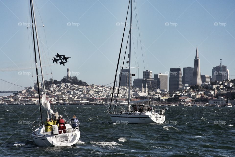 Blue Angels . Blue Angel formation above the San Francisco Bay during fleet Week 
