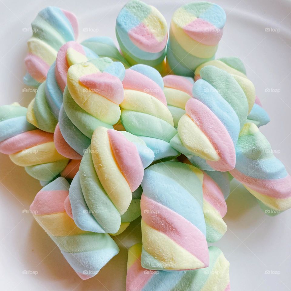 Fluffy, twisty, colorful marshmallows.
