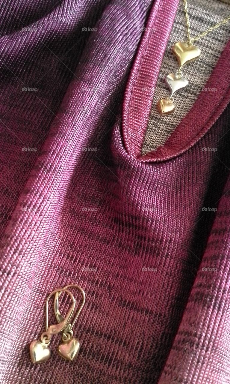 maroon pink purple blouse with gold heart jewelry