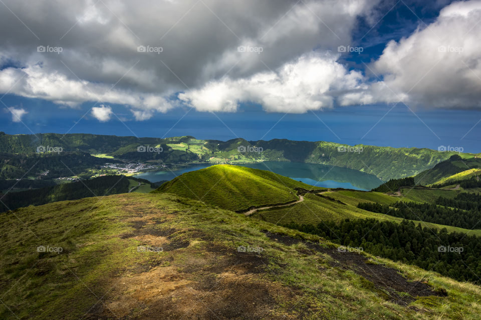 Hiking on the trail of Mata do Canario around the vulcanic lakes of Sete Cidades in Sao Miguel Island, Azores, Portugal.