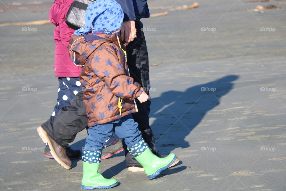 Walk on the beach on a cold sunny day