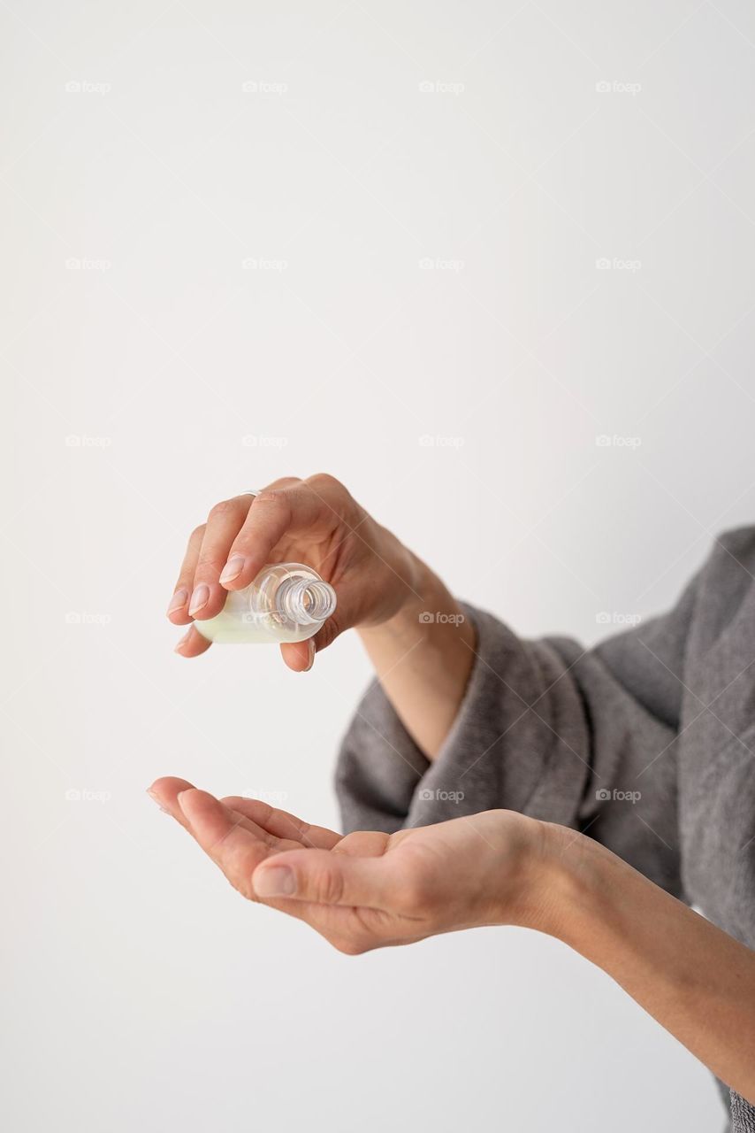 woman applying lotion