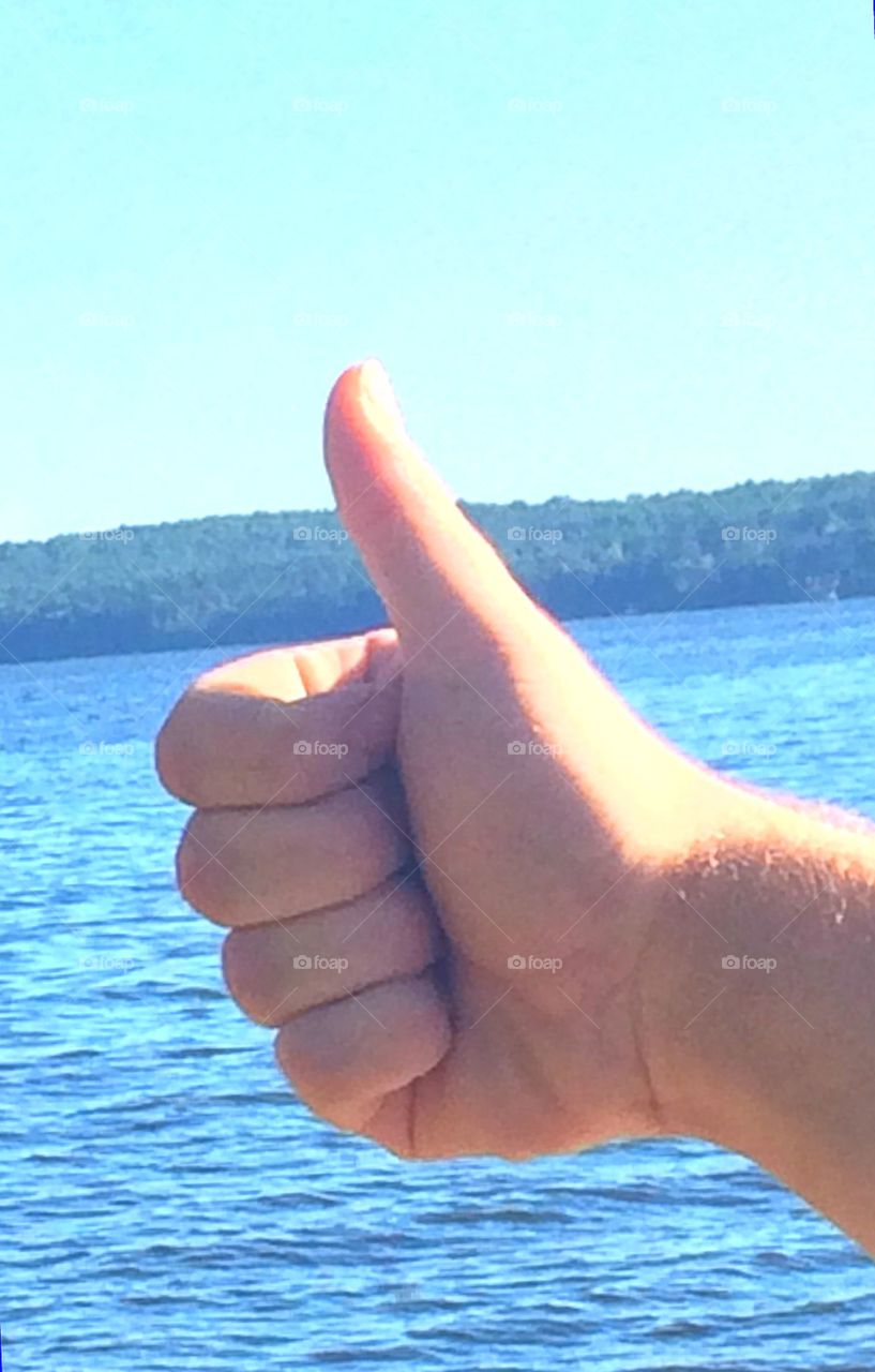 Thumbs up from the lake