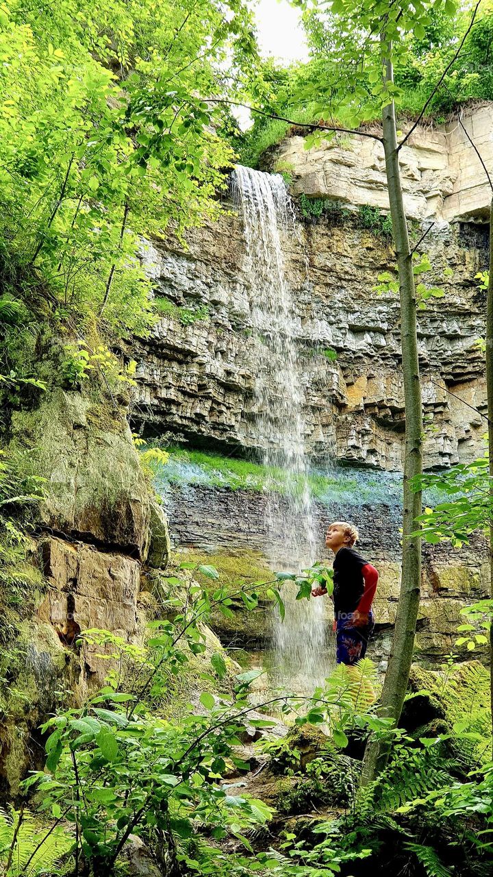 scenic rock formations and waterfall