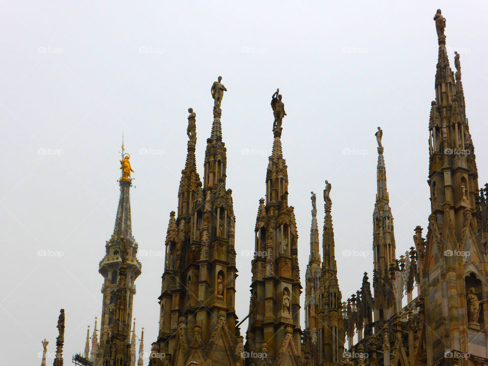 the beauty of the skyline of the roof of Milan Cathedral