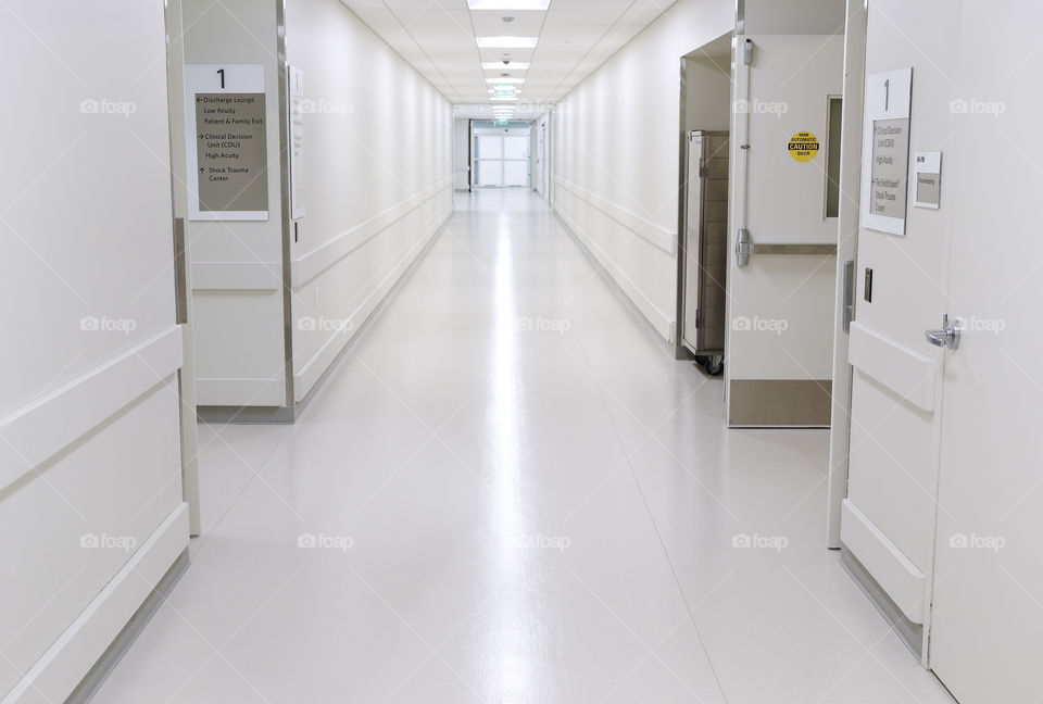 Long empty hospital hallway 