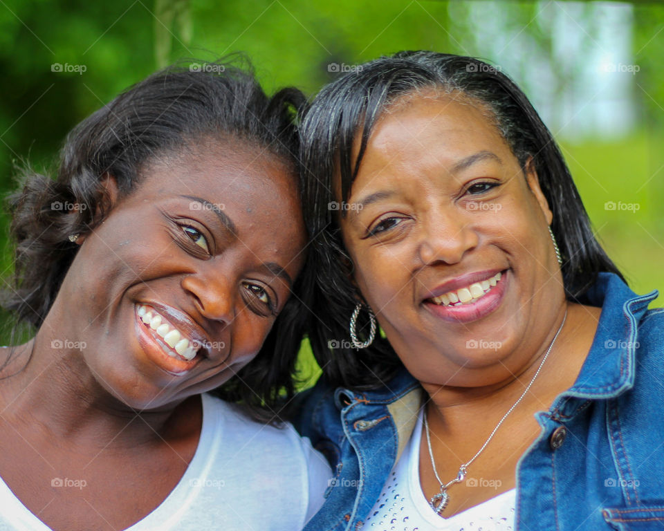 Portrait of two friends smiling