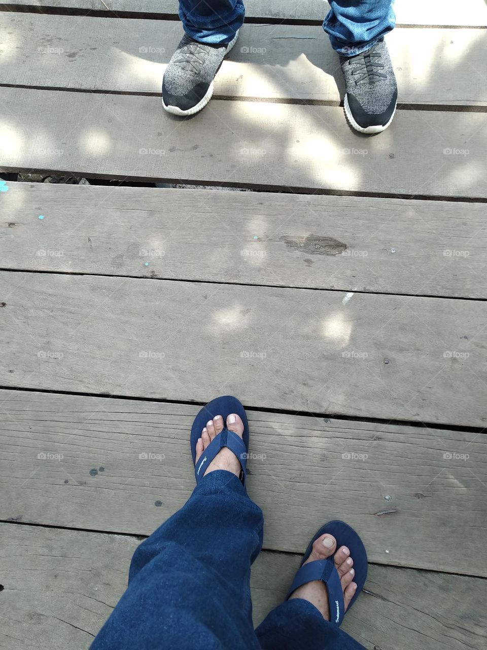 Sandals versus shoes on boards.