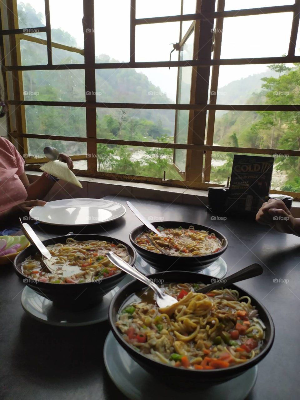 Noodles by the hills
This is us four friends having soupy noodles in a stall by the hills on our way back to the plains and mundane city life after spending 3 days in the beautiful hills of West Bengal,India.