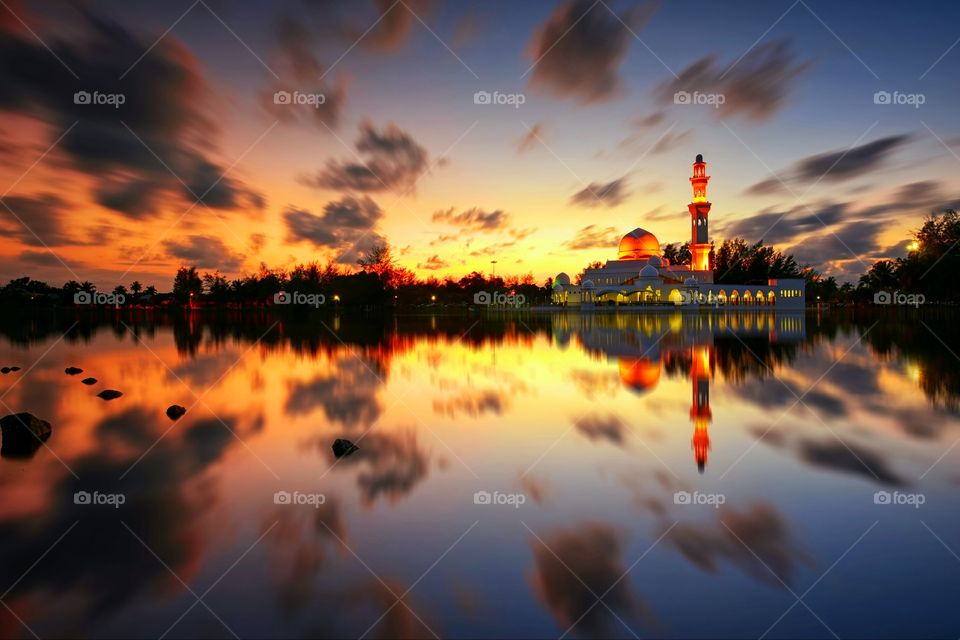 Magical Reflections. Sunset reflections of Kuala Ibai Floating Mosque during golden hour