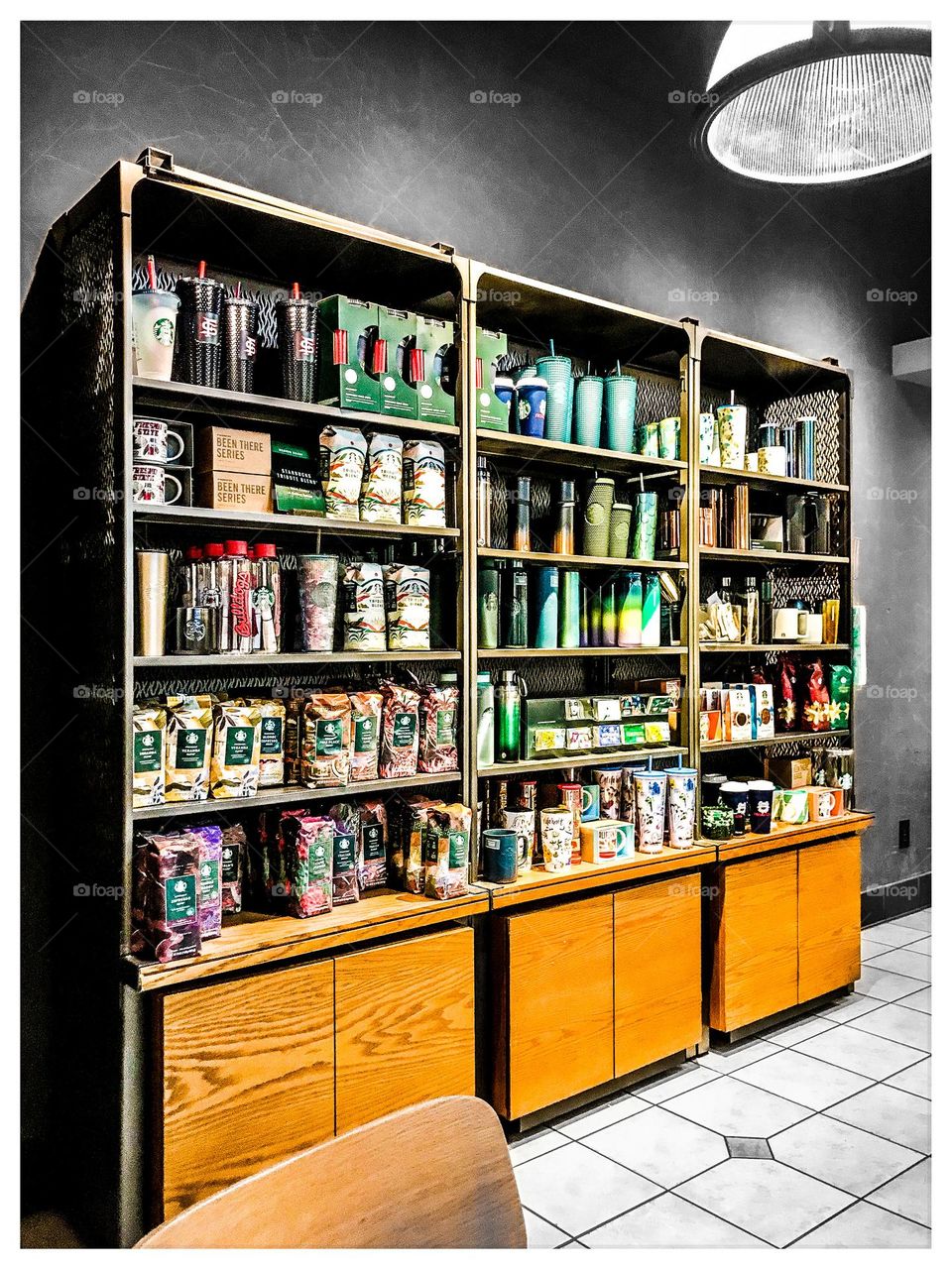 Goods for sale out in the lobby of Starbucks.