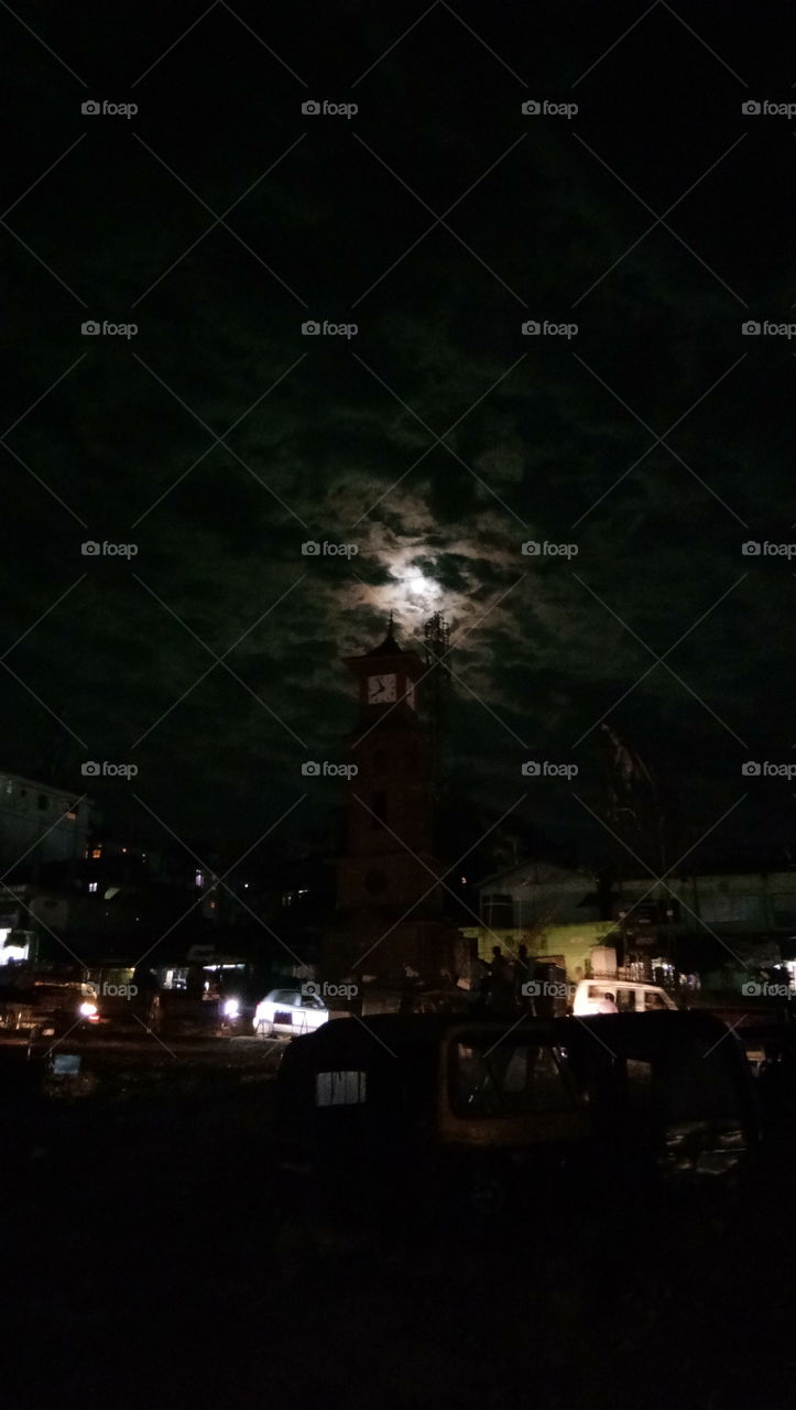 Evening clock tower Itanagar under moon