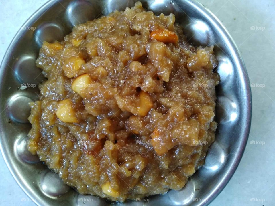 Healthy poha halwa # looking delicious #with dry fruits # cashews #badam # raisins.