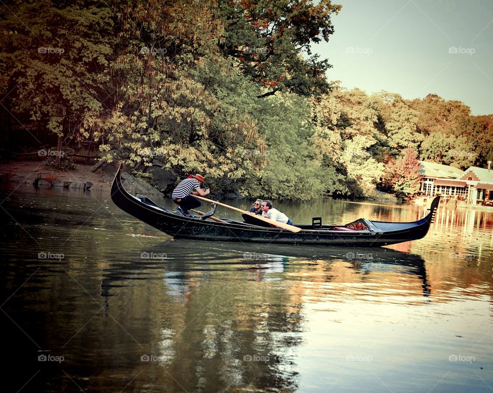 Gondola in Central Park. cute couple in central park gondola