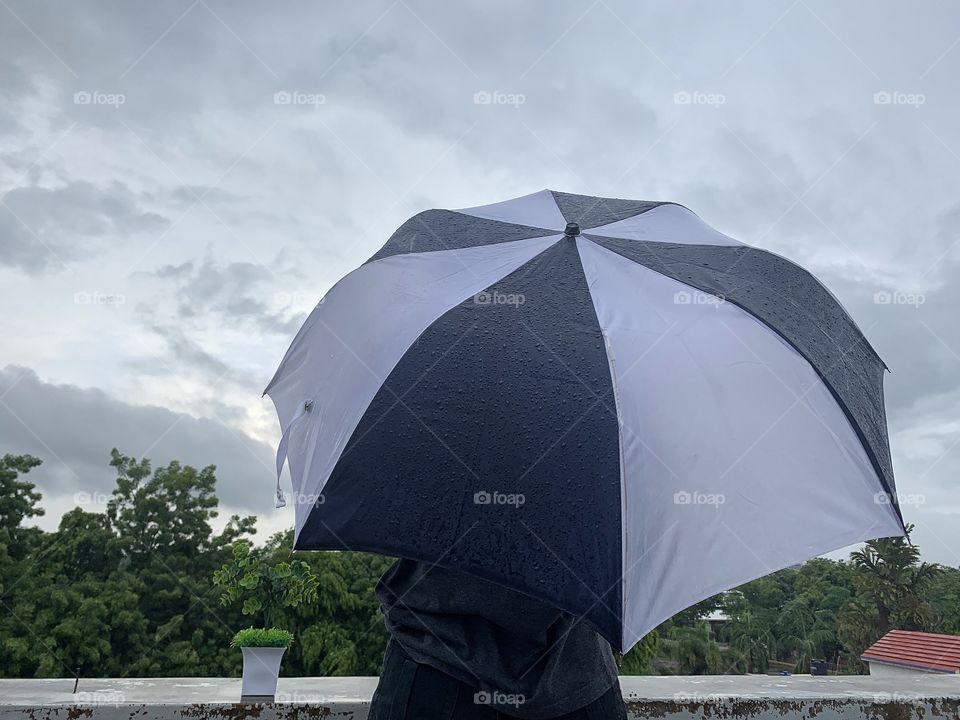 Monsoon evening
umbrella ☔ in the rain open terrace